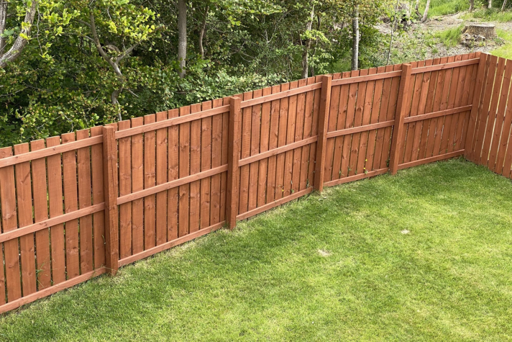 Arch - 1.8m high baoarded and treated fence